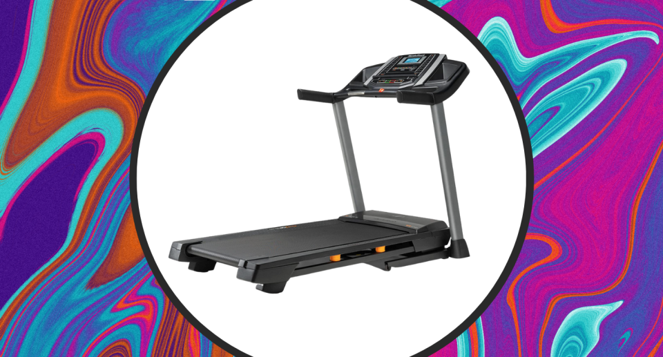 black amazon treadmill on rainbow swirl background 