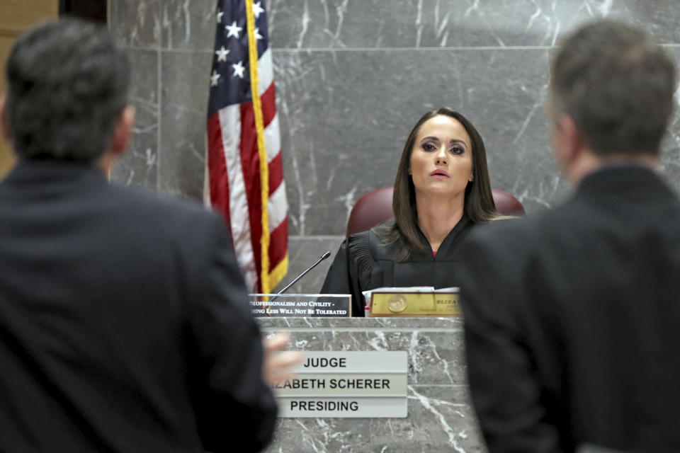 Circuit Judge Elizabeth Scherer addresses prosecutors during a status hearing for Parkland school shooting suspect Nikolas Cruz at the Broward Courthouse in Fort Lauderdale, Fla., Thursday, Feb. 21, 2019. Circuit Judge Elizabeth Scherer said at a brief hearing that she intends to set a definitive trial date soon for 20-year-old Nikolas Cruz, who faces the death penalty if convicted. Cruz is accused of killing 17 and wounding 17 in the February 2018 mass shooting at Marjory Stoneman Douglas High School in Parkland, Fla. (Amy Beth Bennett/South Florida Sun-Sentinel via AP, Pool