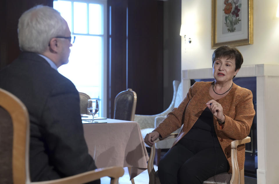 Kristalina Georgieva, right, Managing Director of the International Monetary Fund (IMF), speaks to AP Business Writer David McHugh during an interview with The Associated Press in Berlin, Germany, Tuesday, Nov. 29, 2022. (AP Photo/Michael Sohn)