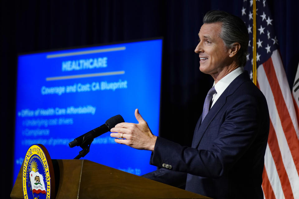 California Gov. Gavin Newsom unveils his proposed $286 billion 2022-2023 state budget during a news conference in Sacramento, Calif., Monday, Jan. 10, 2022. Newsom wants to make California the first state to cover everyone under its Medicaid plan regardless of their immigration status. (AP Photo/Rich Pedroncelli)