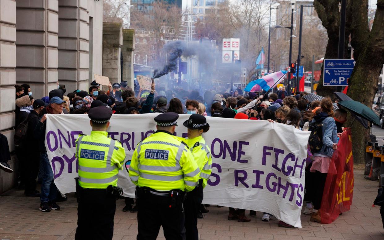 Police officers were required to prevent demonstrators gaining entrance to the conference