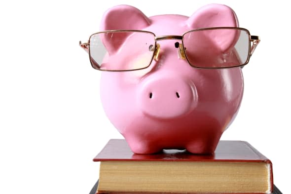 piggy bank with glasses and...