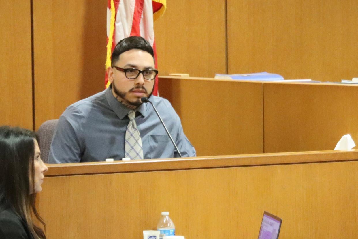 Defendant Euren Balbuena testifies on Nov. 8 during a trial about the fatal stabbing in 2020 of his girlfriend in Simi Valley. Jurors convicted him of murder on Tuesday.