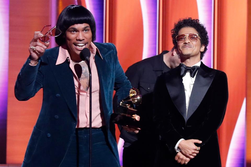 Anderson .Paak and Bruno Mars of Silk Sonic accept the Record Of The Year award for ‘Leave The Door Open’ onstage during the 64th Annual GRAMMY Awards at MGM Grand Garden Arena on April 03, 2022 in Las Vegas, Nevada.