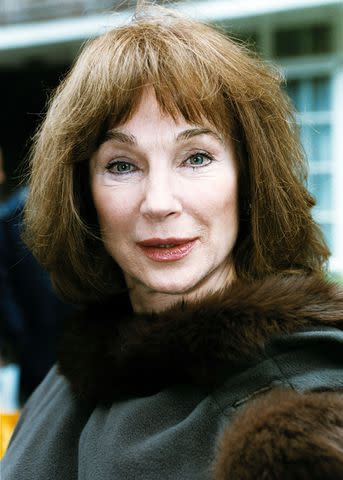 <p>Michael Crabtree/PA Images via Getty</p> Shirley Anne Field photographed outside a house in Aubrey Walk, Kensington, London