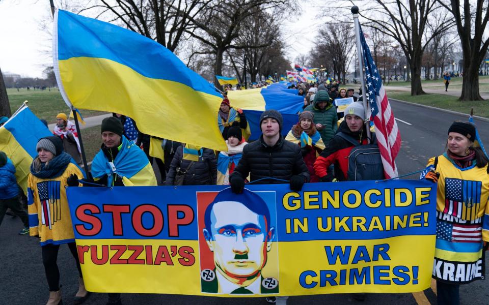 Demonstrators march in support of Ukraine during a rally in Washington - Jose Luis Magana/AP