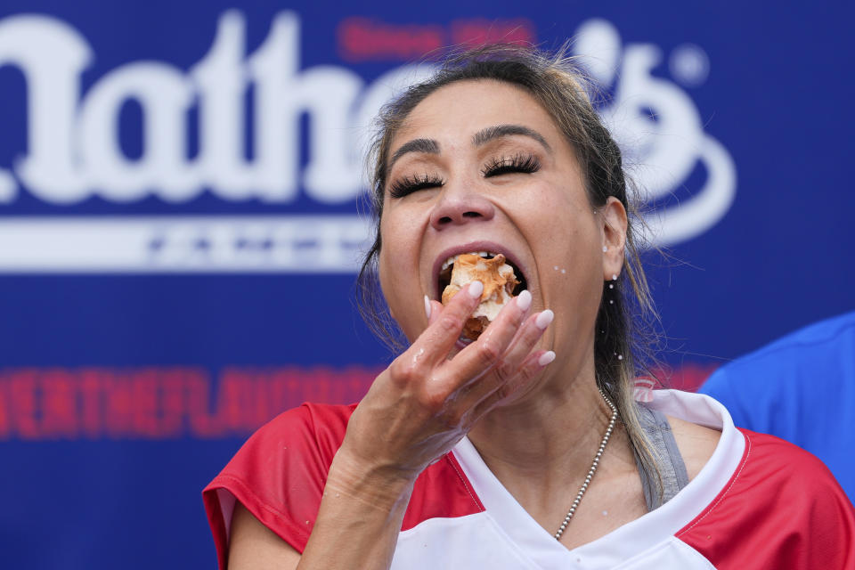 Miki Sudo competes in the women's division of Nathan's Famous Fourth of July hot dog eating contest, Thursday, July 4, 2024, at Coney Island in the Brooklyn borough of New York. (AP Photo/Julia Nikhinson)