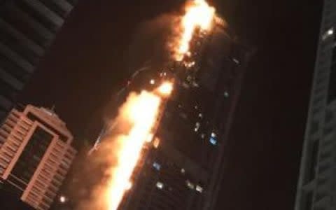 Fire rips through the Torch Tower in Dubai - Credit: Nivetha Vijayathasan
