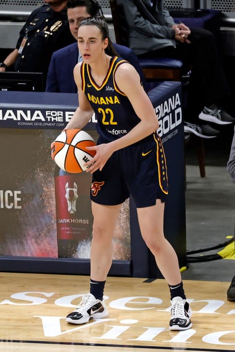 INDIANAPOLIS, IN – MAY 09: Indiana Fever guard Caitlin Clark (22) inbounds the ball against the Atlanta Dream during a WNBA preseason game on May 9, 2024, at Gainbridge Fieldhouse in Indianapolis, Indiana. (Photo by Brian Spurlock/Icon Sportswire via Getty Images)