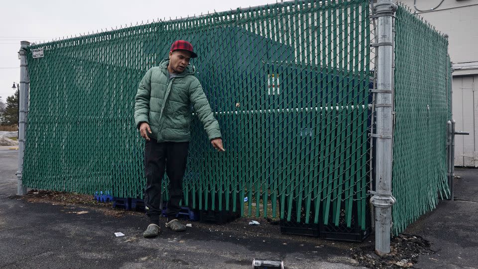 Alexander Jose Vizcaino Marrufo, a Venezuelan migrant, points on January 27 to where he slept for three nights after he was evicted from the Quality Inn used as a shelter in western New York. - Brandon Watson/The New York Times/Redux