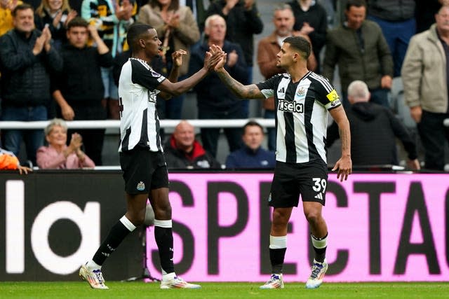 Newcastle’s Alexander Isak (left) celebrates scoring the winner against Tottenham