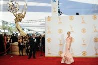 Julie Bowen, wearing Zac Posen, arrives at the 65th Primetime Emmy Awards at Nokia Theatre on Sunday Sept. 22, 2013, in Los Angeles. (Photo by Jordan Strauss/Invision/AP)