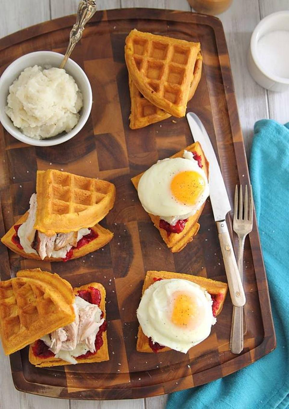 <p>Pile mashed potatoes, cranberry sauce, turkey, and an over-easy egg on top of pumpkin waffles for an early morning treat that truly captures all the <a href="https://www.countryliving.com/food-drinks/g1921/easy-fall-recipes/" rel="nofollow noopener" target="_blank" data-ylk="slk:best tastes of fall.;elm:context_link;itc:0;sec:content-canvas" class="link ">best tastes of fall.</a><br></p><p><strong>Get the recipe at <a href="https://www.runningtothekitchen.com/thanksgiving-leftover-waffle-breakfast-sandwiches/" rel="nofollow noopener" target="_blank" data-ylk="slk:Running to the Kitchen;elm:context_link;itc:0;sec:content-canvas" class="link ">Running to the Kitchen</a>.</strong> </p>