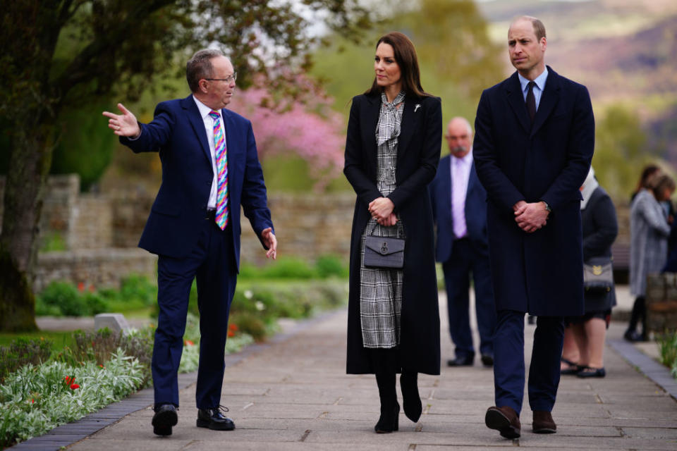 Aberfan disaster child survivor David Davies (L), walks with Prince William and Kate Middleton during a visit to the Aberfan memorial garden in Wales on April 28, 2023.<span class="copyright">Ben Birchall—Getty Images</span>