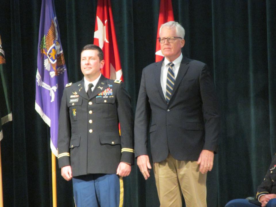 Retired Col. Christopher Miller is inducted as a distinguished member of the Special Forces Regiment during a ceremony Thursday, April 20, 2023, at Fort Bragg.
