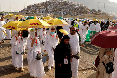 Muslim pilgrims gather on Mount Mercy on the plains of Arafat during the annual haj pilgrimage, outside the holy city of Mecca, Saudi Arabia August 20, 2018. REUTERS/Zohra Bensemra