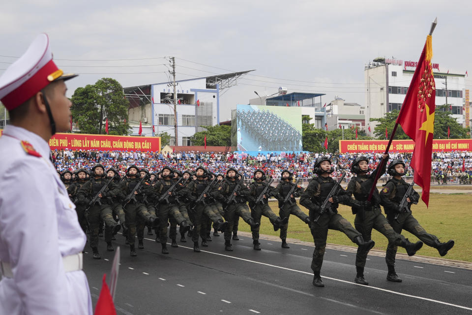 Soldiers participate in a parade commemorating the victory of Dien Bien Phu battle in Dien Bien Phu, Vietnam, Tuesday, May 7, 2024. Vietnam is celebrating the 70th anniversary of the battle of Dien Bien Phu, where the French army was defeated by Vietnamese troops, ending the French colonial rule in Vietnam. (AP Photo/Hau Dinh)