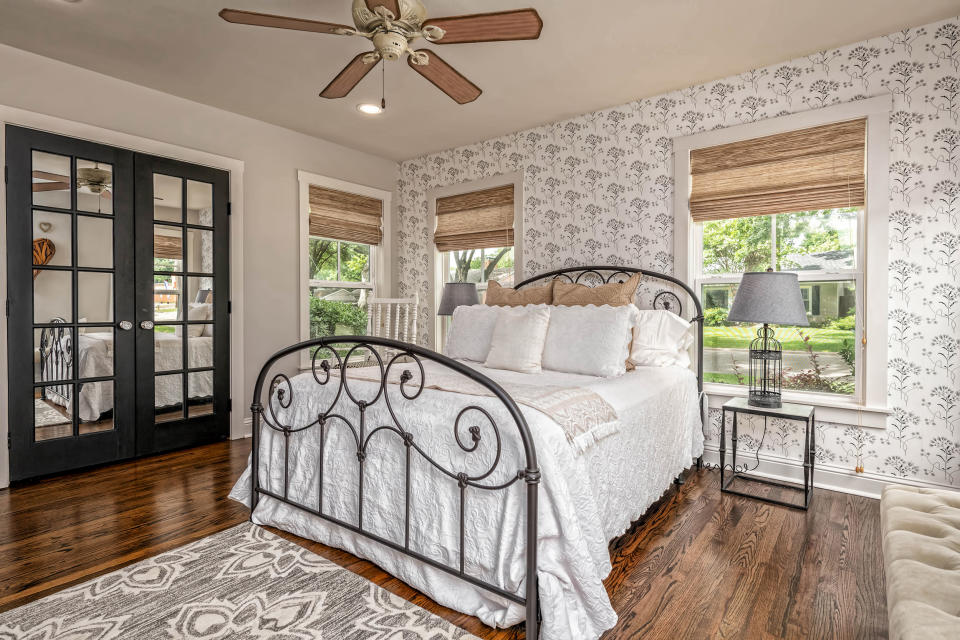 The master bedroom gets plenty of sun and has a spacious closet.  (Carol Embry, Picture It Sold(R))