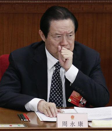 Former China's Politburo Standing Committee Member Zhou Yongkang attends the second plenary meeting of the National People's Congress (NPC) at the Great Hall of the People in Beijing in this March 8, 2012 file photo. REUTERS/Jason Lee