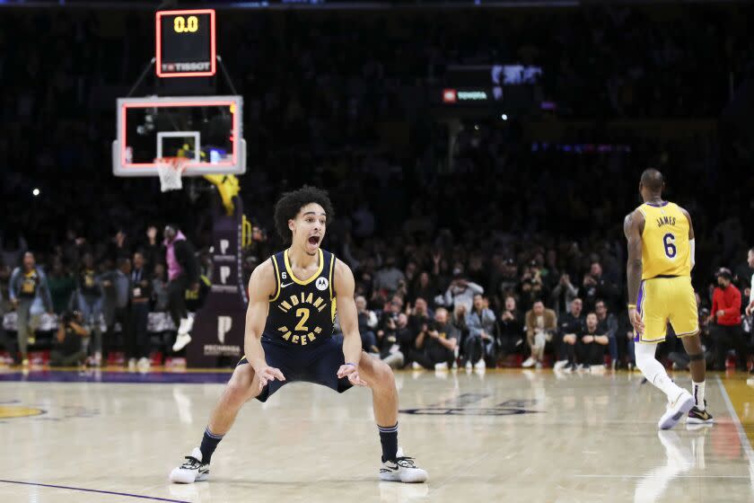 Los Angeles, CA - November 28: Indiana Pacers guard Andrew Nembhard (2) celebrates after making the game winning shot with seconds left during the second half against the Los Angeles Lakers at Crypto.com Arena on Monday, Nov. 28, 2022 in Los Angeles, CA. (Allen J. Schaben / Los Angeles Times)