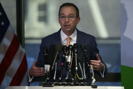 Office of Management and Budget (OMB) Director Mick Mulvaney speaks to the media at the U.S. Consumer Financial Protection Bureau (CFPB), where he began work earlier in the day after being named acting director by U.S. President Donald Trump in Washington November 27, 2017. REUTERS/Joshua Roberts