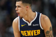 Denver Nuggets forward Michael Porter Jr. reacts after hitting a 3-point basket in the second half of Game 5 of an NBA basketball first-round playoff series against the Los Angeles Lakers Monday, April 29, 2024, in Denver. (AP Photo/David Zalubowski)