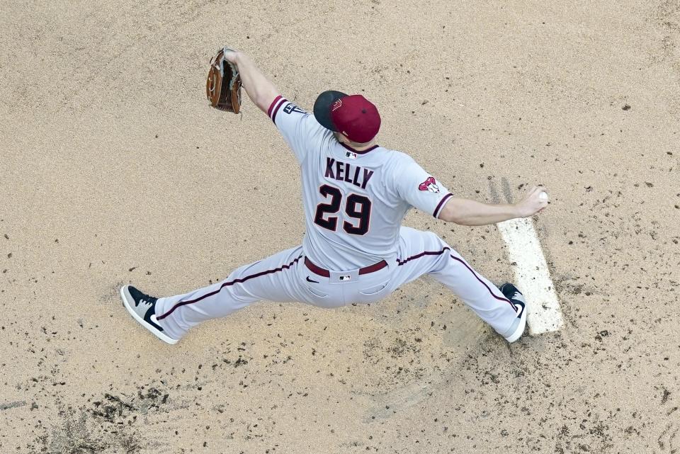 Arizona Diamondbacks starting pitcher Merrill Kelly throws during the first inning of a baseball game against the Milwaukee Brewers Monday, June 19, 2023, in Milwaukee. (AP Photo/Morry Gash)