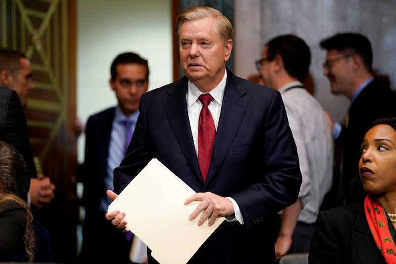 FILE PHOTO: Sen. Lindsay Graham (R-SC) arrives ahead of U.S. Attorney General William Barr testifying before a Senate Judiciary Committee hearing entitled "The Justice Department's Investigation of Russian Interference with the 2016 Presidential Election.\