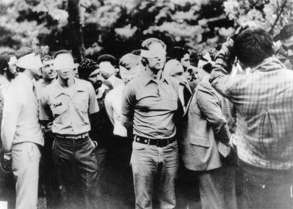 First day of occupation of the U.S. Embassy in Tehran shows American hostages being paraded by their militant Iranian captors in 1979. (Photo: Bettmann Archive via Getty Images)