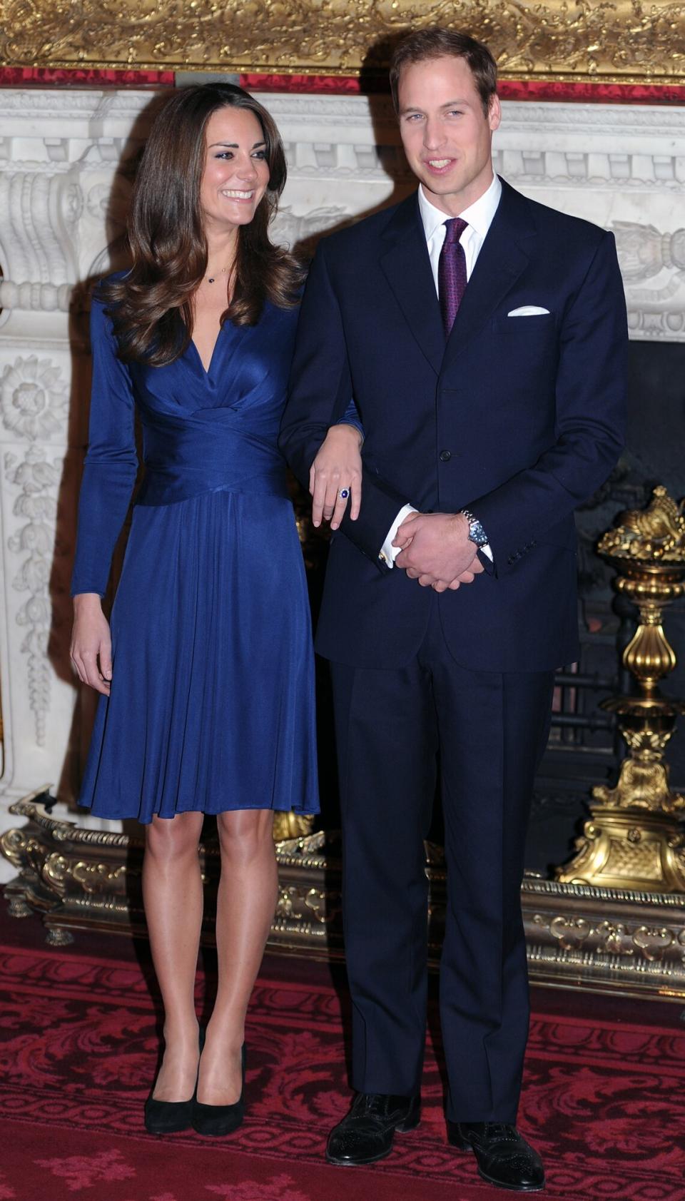 Prince William and Catherine Middleton pose for photographs in the State Apartments of St James Palace as they announce their engagement on November 16, 2010 in London, England