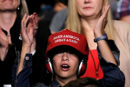 Supporters of U.S. President Donald Trump attend a rally in Springfield, Missouri, September 21, 2018. Picture taken September 21, 2018. REUTERS/Mike Segar