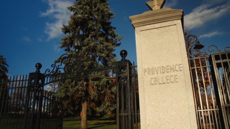 A Nigerian security guard at Providence College in Rhode Island, (above) received the surprise of a lifetime when students raised money for a gift trip home to see his family. (Photo: Screenshot/YouTube.com/Amy Bencomo)