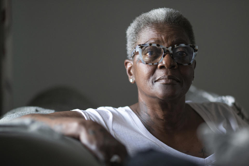 Yvette Mack poses for a picture at her home, Tuesday, May 17, 2022, in Buffalo, N.Y. Mack was a frequent visitor to the Tops Friendly Market on Jefferson Avenue but says she may never go back after the shooting there. (AP Photo/Joshua Bessex)