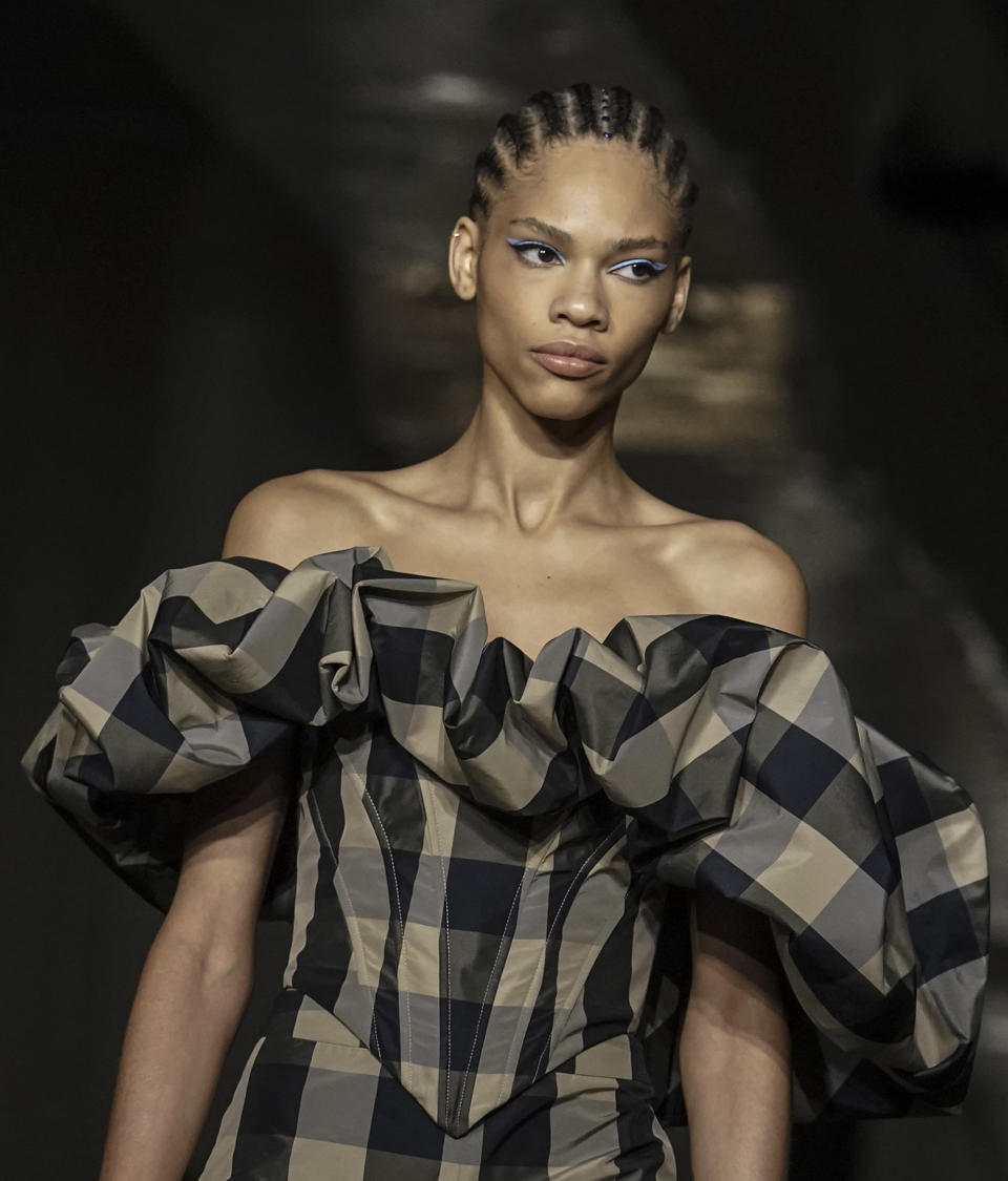 Fashion from Christian Siriano's fall/winter 2022 collection is modeled during Fashion Week, Saturday Feb. 12, 2022, in New York. (AP Photo/Bebeto Matthews)