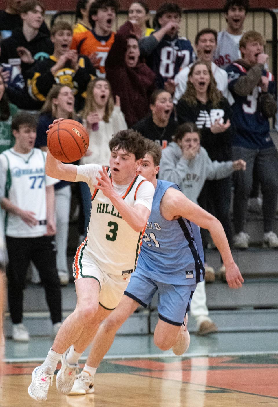 Hopkinton junior Cooper Willadsen grabs a rebound during the game against Medfield in Hopkinton, Feb. 6, 2024. The Hillers beat the Big Blue, 79-57.