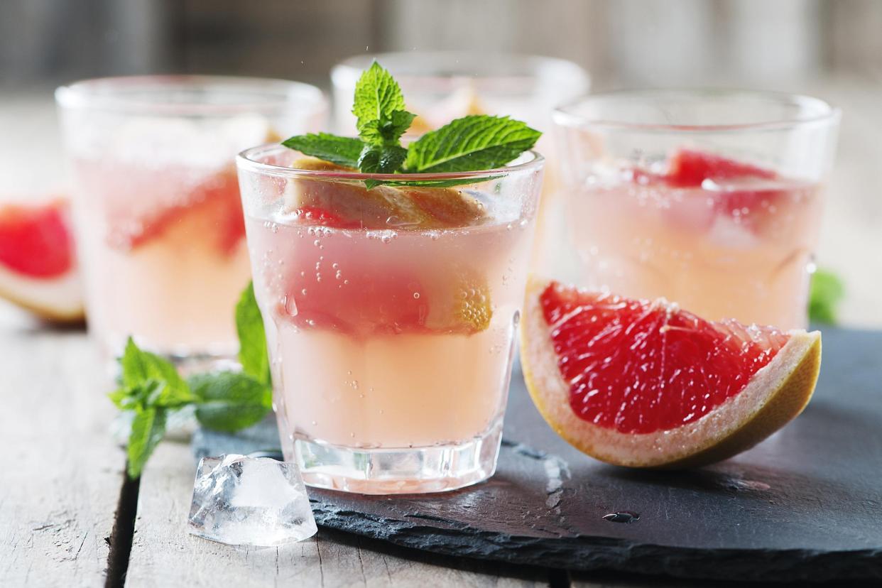 pink grapefruit cocktail with ice and mint