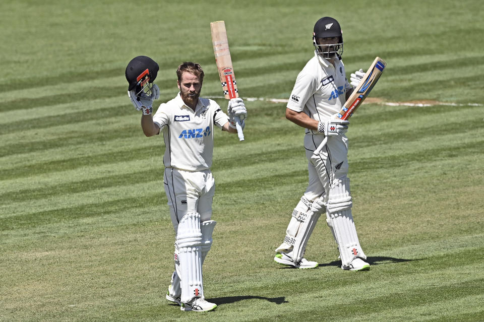 New Zealand's Kane Williamson celebrates his double century during play on day two of the first cricket test between the West Indies and New Zealand in Hamilton, New Zealand, Friday, Dec. 4, 2020. (Andrew Cornaga/Photosport via AP)