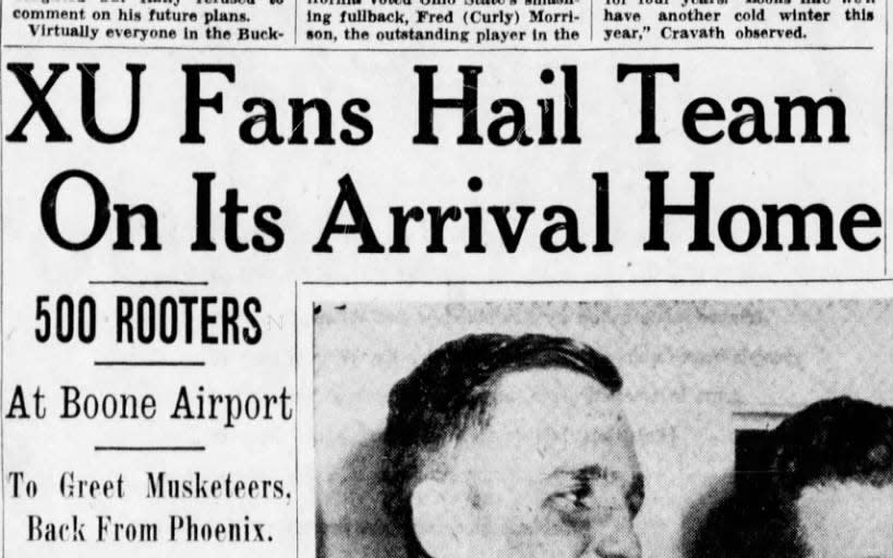 Five hundred Xavier football fans welcomed the Musketeers at the Greater Cincinnati Airport in Boone County after the team's Salad Bowl victory over Arizona State.