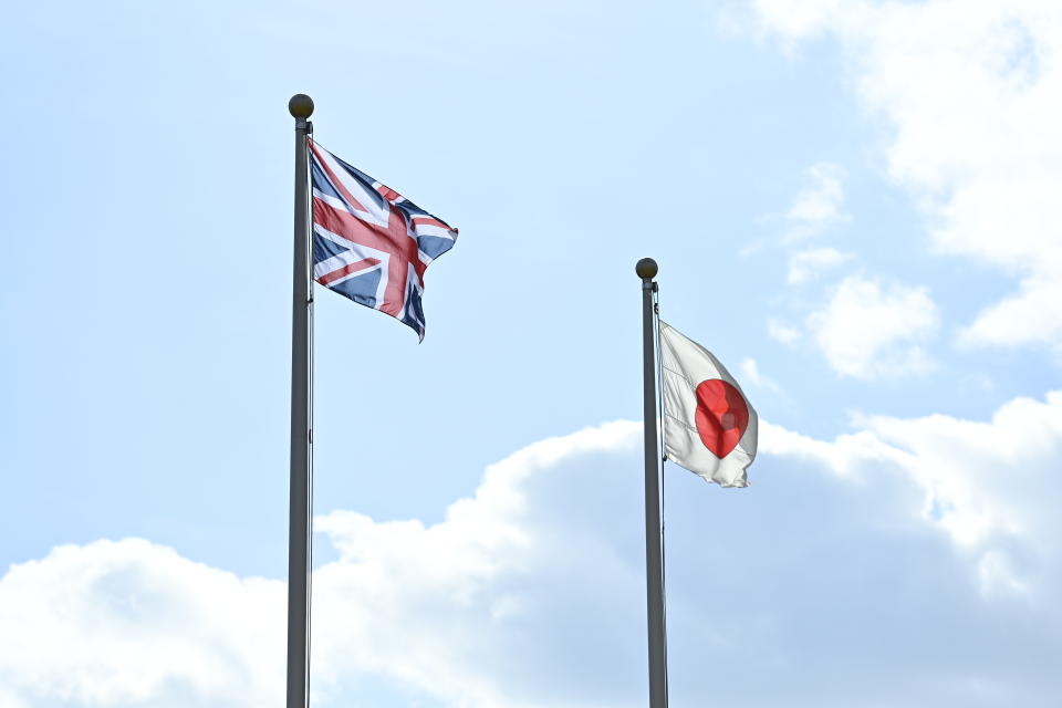 GUNMA, JAPAN - NOVEMBER 22 : National flag of Japan and United Kingdom is seen fluttered in the wind as Japan Ground Self-Defense Force (JGSDF) and British Army attend the opening ceremony of Bilateral Field Training Exercise with the British Army âVIGILANT ISLES 22â at Camp Samogahara on November 22, 2022, in Gunma Prefecture, Japan. The 1st Airborne Brigade of the Japan Ground Self-Defense Force, The 7th Air Wing of Japan Air Self-defense Force, and the 1st Royal Horse Artillery Regiment of the British Army, will conduct a joint exercise âVIGILANT ISLES 22â on island defense based on the geographical characteristics of both Japan and the United Kingdom, from 22 to 30 Nov. in Japan. (Photo by David Mareuil/Anadolu Agency via Getty Images)