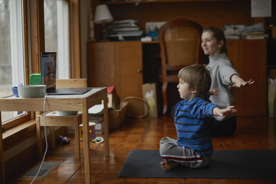 Online workout classes for kids, like yoga and stretches. (Photo: Patrick Fraser via Getty Images)