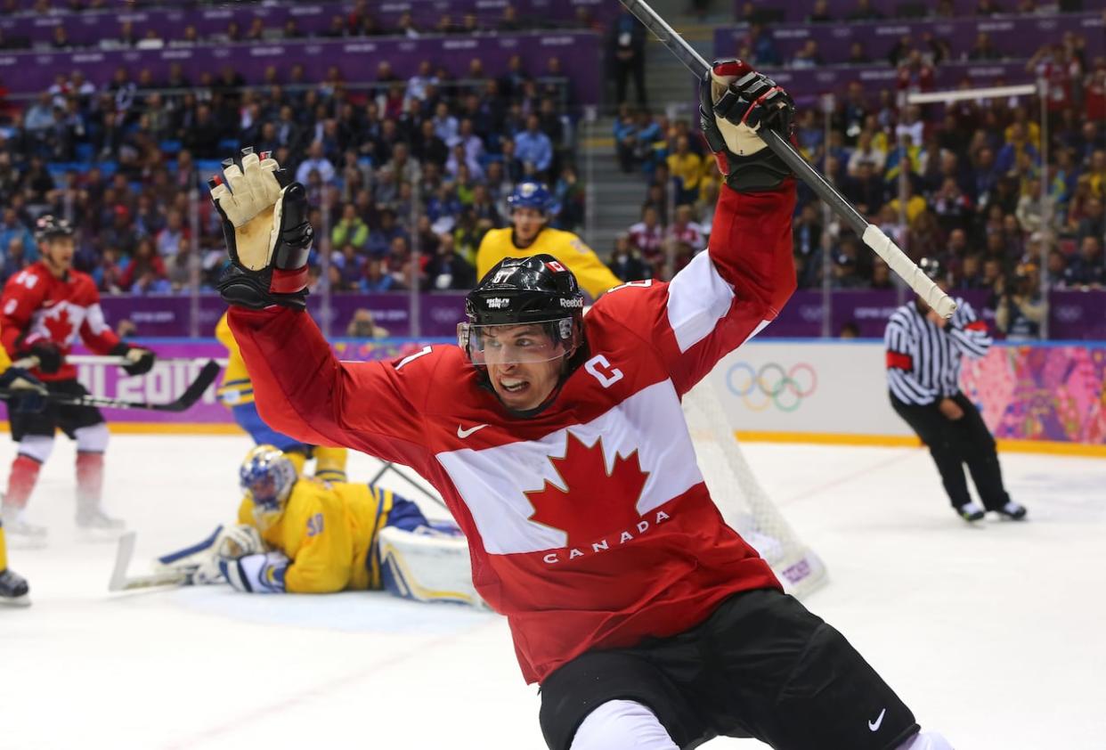 Canada's Sidney Crosby celebrates his goal during the gold-medal game at the 2014 Olympics. On Friday, commissioner Gary Bettman announced that NHL players would be returning to the Olympics in 2026. (Martin Rose/Getty Images - image credit)