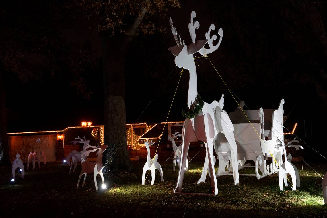 An impressive collection of wooden reindeer fill the yard at 846 N. Crestline. The popular Christmas on Crestline light show is a few doors down at 914 N. Crestline.