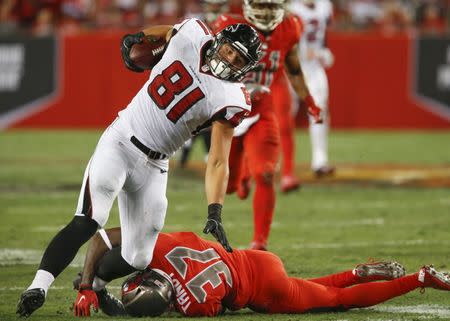 Nov 3, 2016; Tampa, FL, USA; Atlanta Falcons tight end Austin Hooper (81) is tackled by Tampa Bay Buccaneers strong safety Keith Tandy (37) during the second half of a football game at Raymond James Stadium. The Falcons won 43-28. Mandatory Credit: Reinhold Matay-USA TODAY Sports