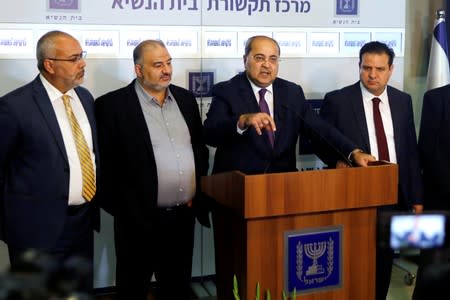 Memebers of the Joint List party, speak with the media following a meeting with Israeli President Reuven Rivlin as he began talks with political parties over who should form a new government, at his residence in Jerusalem