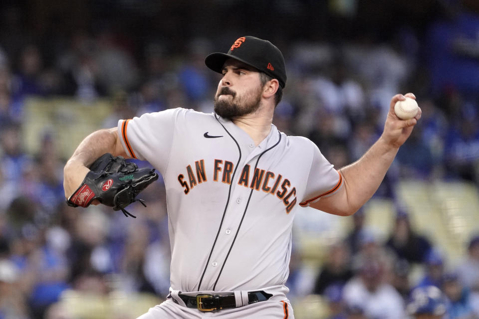 San Francisco Giants starting pitcher Carlos Rodon throws to the plate during the first inning of a baseball game against the Los Angeles Dodgers Tuesday, May 3, 2022, in Los Angeles. (AP Photo/Mark J. Terrill)