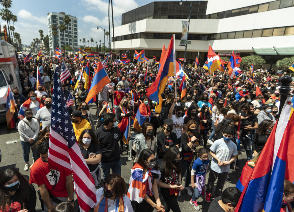 Armemian-American hold a rally against the Armenian genocide in Beverly Hills, Calif., Saturday, April 24, 2021. The systematic killing and deportation of more than a million Armenians by Ottoman Empire forces in the early 20th century was "genocide," the United States formally declared on Saturday, as President Joe Biden used that precise word after the White House had avoided it for decades for fear of alienating ally Turkey. (AP Photo/Damian Dovarganes)