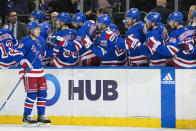 New York Rangers left wing Artemi Panarin is congratulated for a goal against the Philadelphia Flyers during the first period of an NHL hockey game Thursday, April 11, 2024, at Madison Square Garden in New York. (AP Photo/Mary Altaffer)