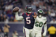 Houston Texans quarterback Tyrod Taylor (5) passes in the first half of an NFL football game against the New York Jets in Houston, Sunday, Nov. 28, 2021. (AP Photo/Eric Smith)