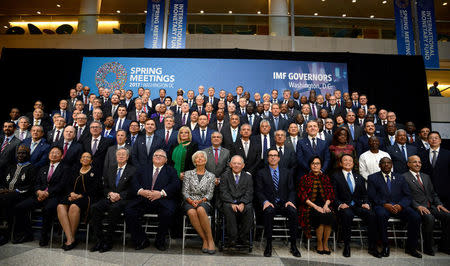 Finance ministers and bank governors pose for a "family" photo for the International Monetary and Financial Committee (IMFC), as part of the IMF and World Bank's 2017 Annual Spring Meetings, in Washington, U.S., April 22, 2017. REUTERS/Mike Theiler