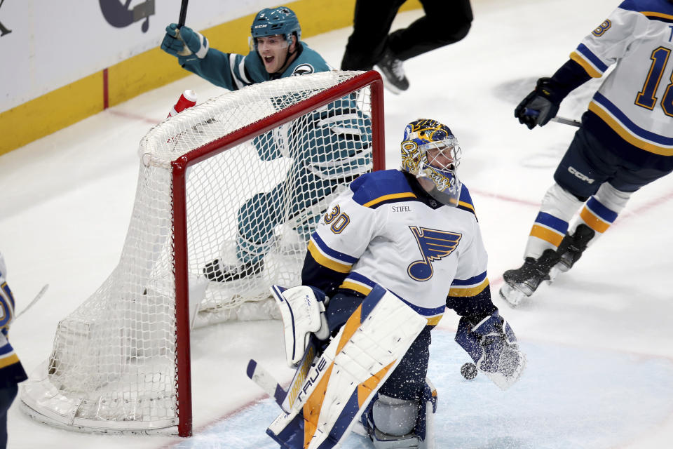 San Jose Sharks left wing William Eklund (72) scores the game-winning goal past St. Louis Blues goaltender Joel Hofer (30) giving him a hat trick and a 3-2 victory in overtime of an NHL hockey game in San Jose, Calif., Saturday, April 6, 2024. (AP Photo/Scot Tucker)